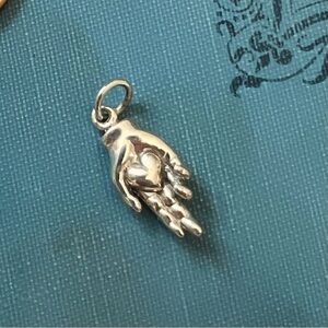 Love Offering Sterling Silver Hand with Heart Charm Pendant